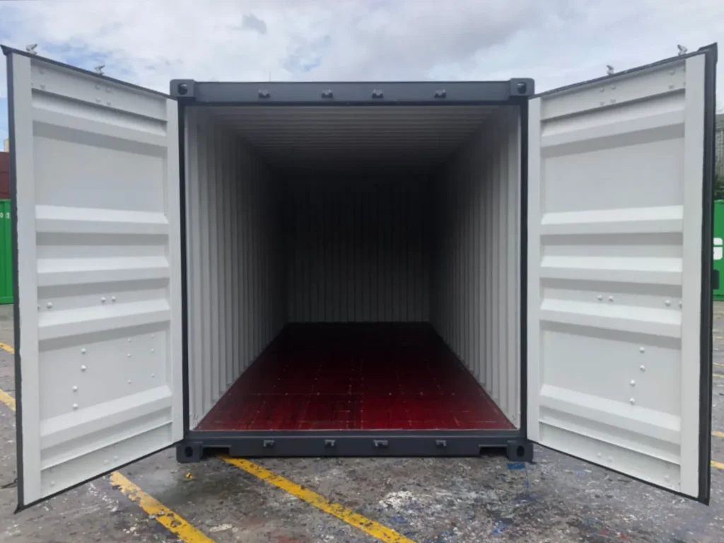 20ft new one trip shipping container — open double doors showing clean red flooring, ideal for archive storage, tools or temporary site equipment, UK delivery.