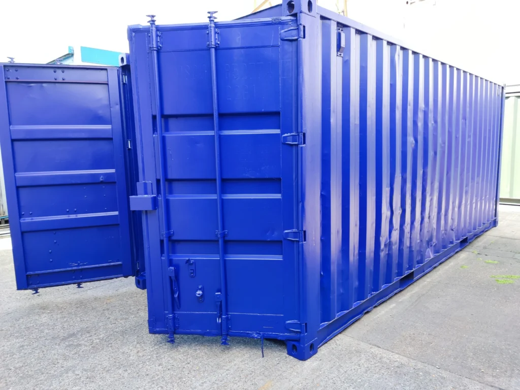 Shipping container with fresh professional paint finish and doors open