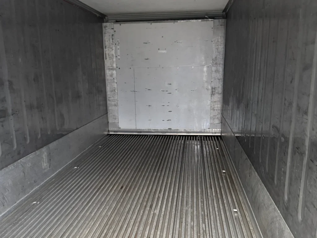 Reefer Container Running Costs: Electricity, Maintenance and Lifespan Interior view of 20ft used marine reefer container showing T-section aluminium floor and insulated walls