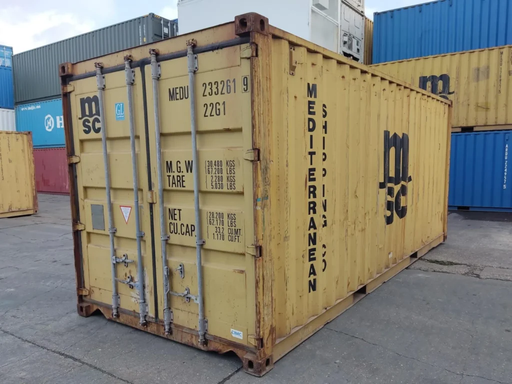 20ft used shipping container in yellow — ex-fleet steel unit with cargo doors, ideal for affordable storage, workshop conversions or farm use across the UK.