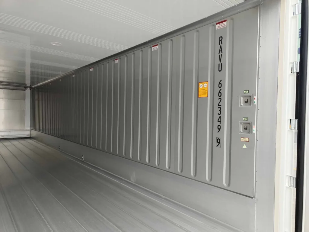 Interior of a 40ft new high cube refrigerated container, showing insulated walls and cooling system panel.