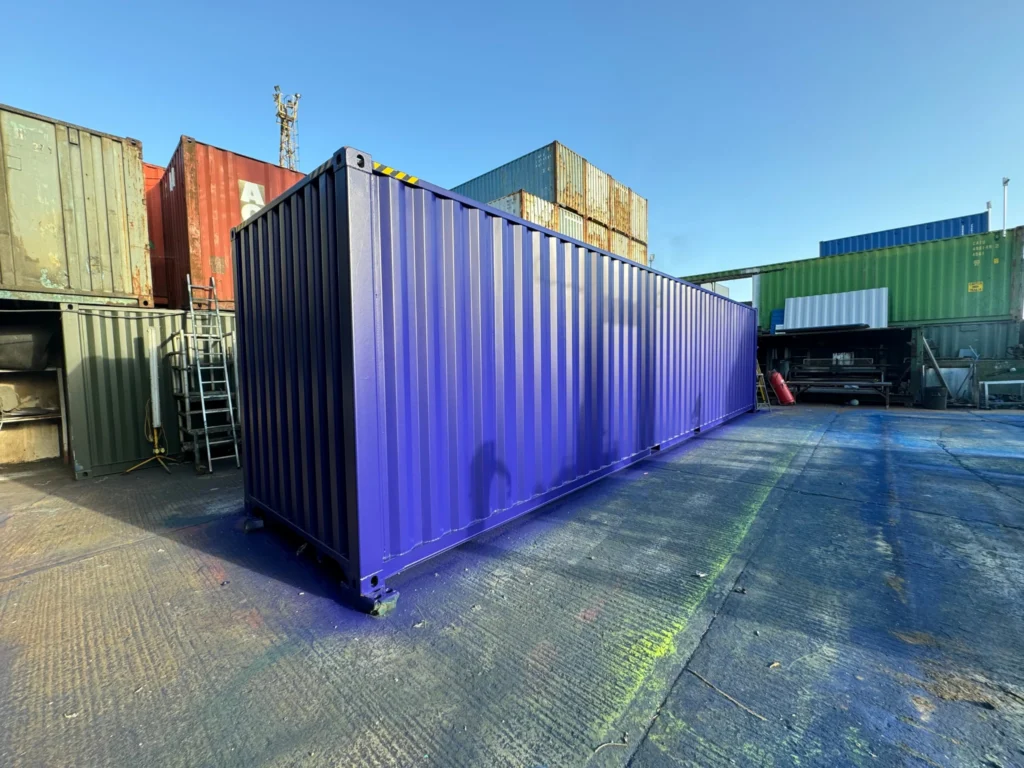 Shipping container freshly spray painted with durable protective coating