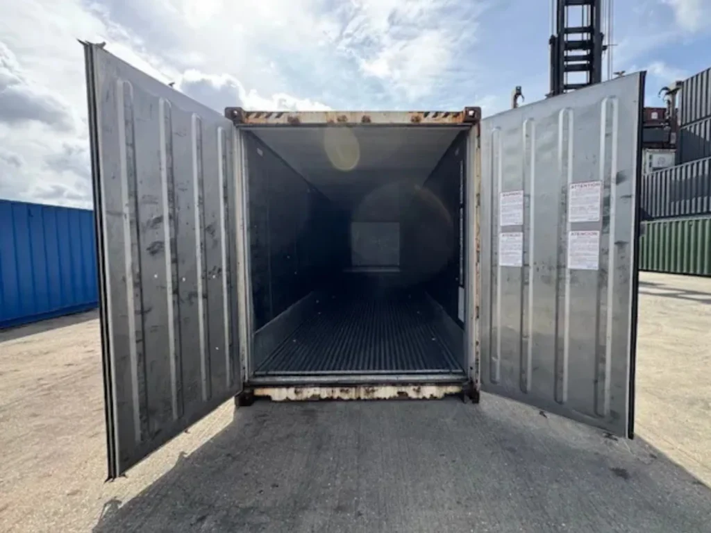 Do Refrigerated Containers Need Planning Permission in the UK? Open doors of a 40ft used high cube reefer container showing interior space.