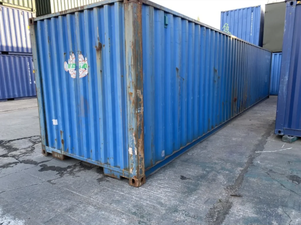 Side view of a 40ft used shipping container standard height at a UK depot