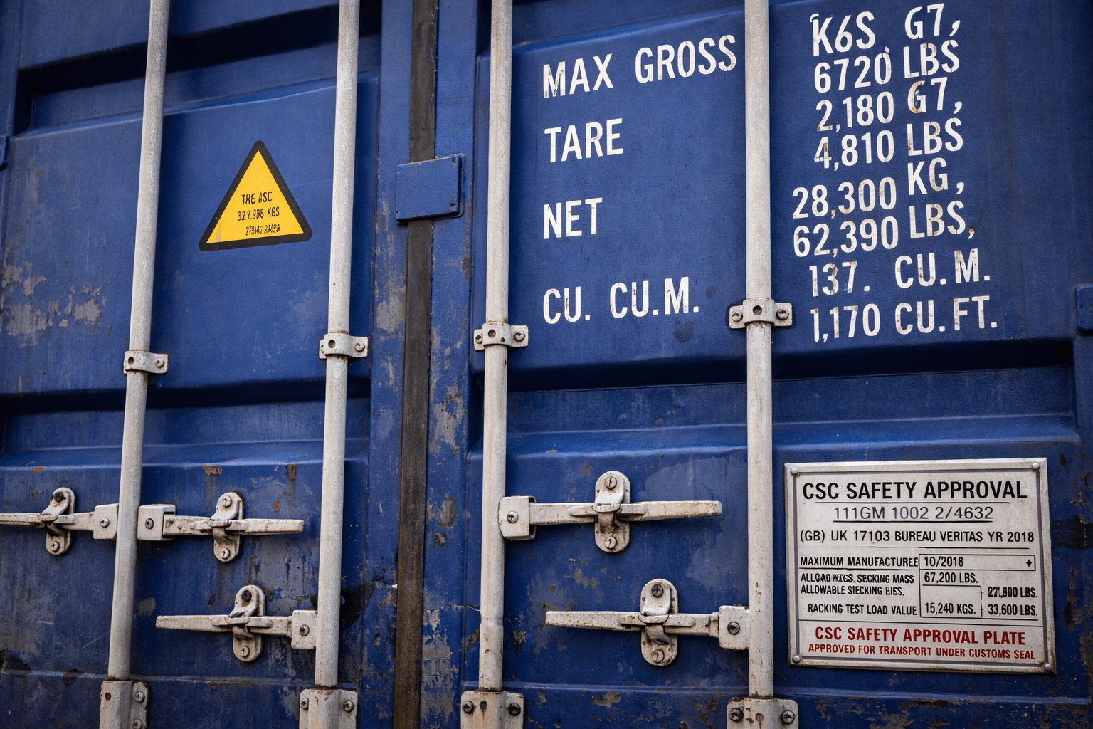 close up view of a blue ral 5013 shipping container